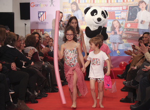 Desfile solidario de moda infantil organizado por la Fundación Garrigou y la Fundación Atlético de Madrid